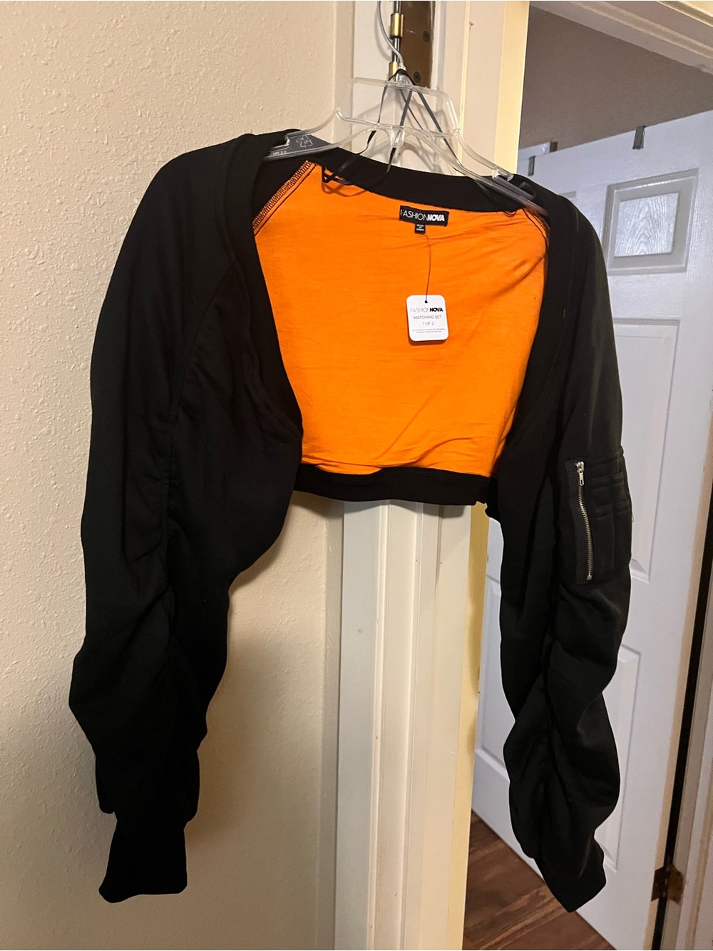 Fashion Nova Black Cropped Bomber Jacket with Orange Lining